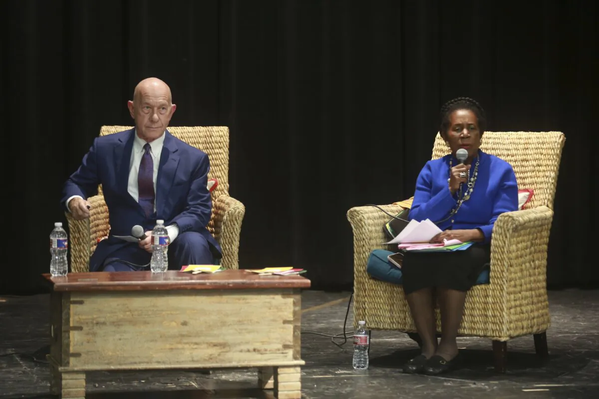 Houston mayoral candidates state Sen. John Whitmire and U.S. Rep. Sheila Jackson Lee (D-Texas) speak at a mayoral forum in Houston on Dec. 3, 2023. (Lekan Oyekanmi/AP Photo)