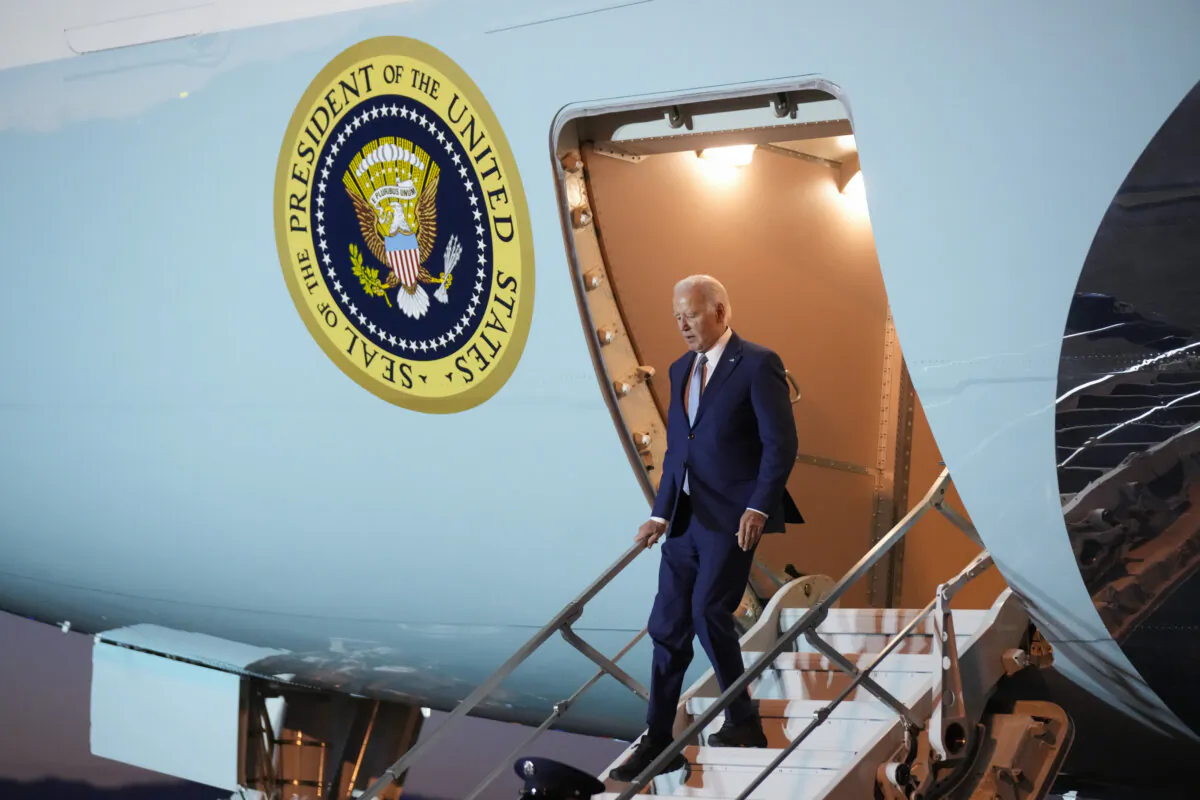 President Joe Biden walks down the stairs of Air Force One as he arrives in Los Angeles on Dec. 8, 2023. (Manuel Balce Ceneta/AP Photo)