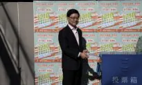Hong Kong Holds 1st Council Elections Under New Rules That Shut Out Pro-Democracy Candidates, Activists Arrested