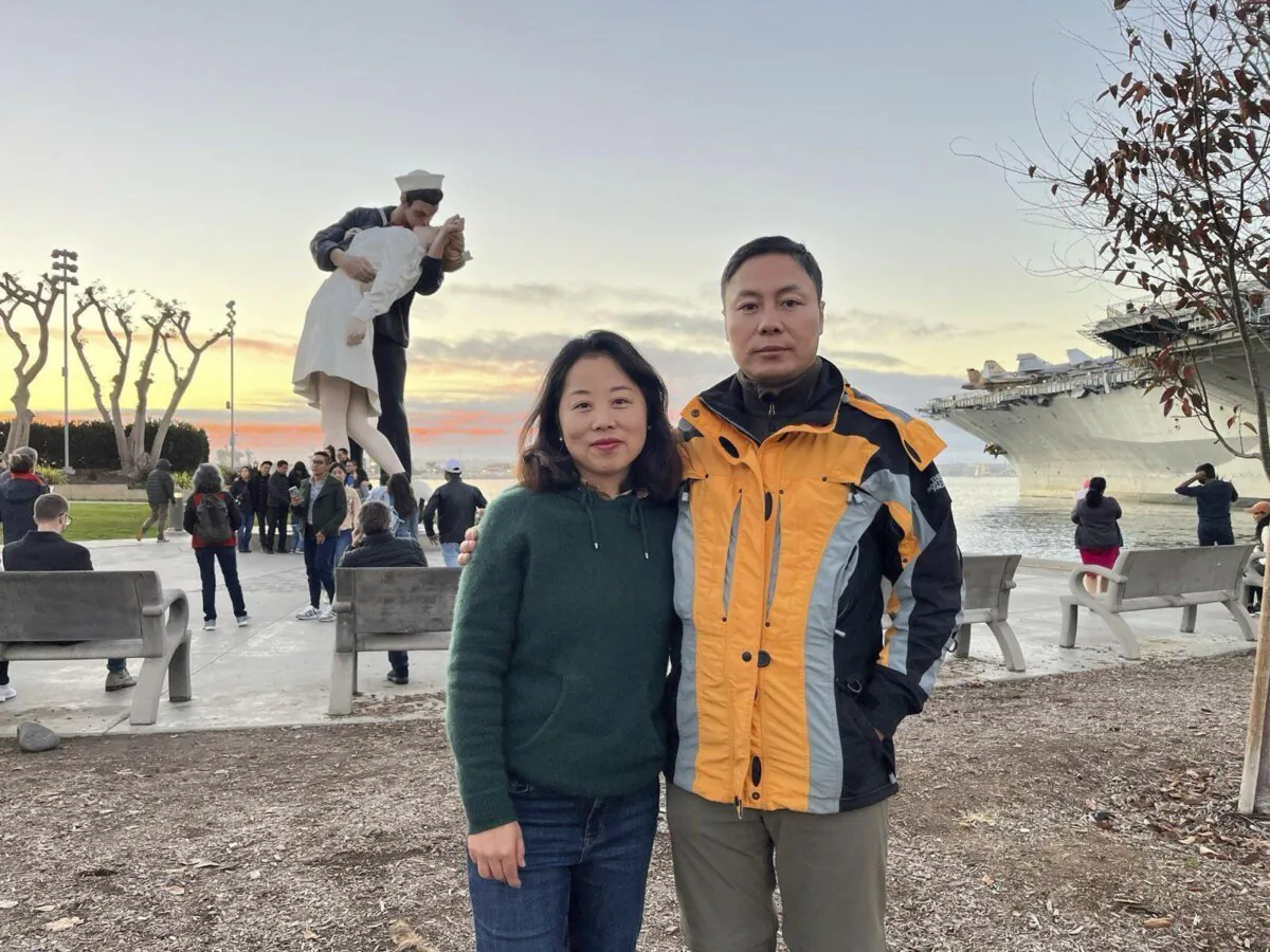 Chinese dissident Liu Sifang and his wife Lina Lu in the United States in an undated photo. (Safeguard Defenders via AP)