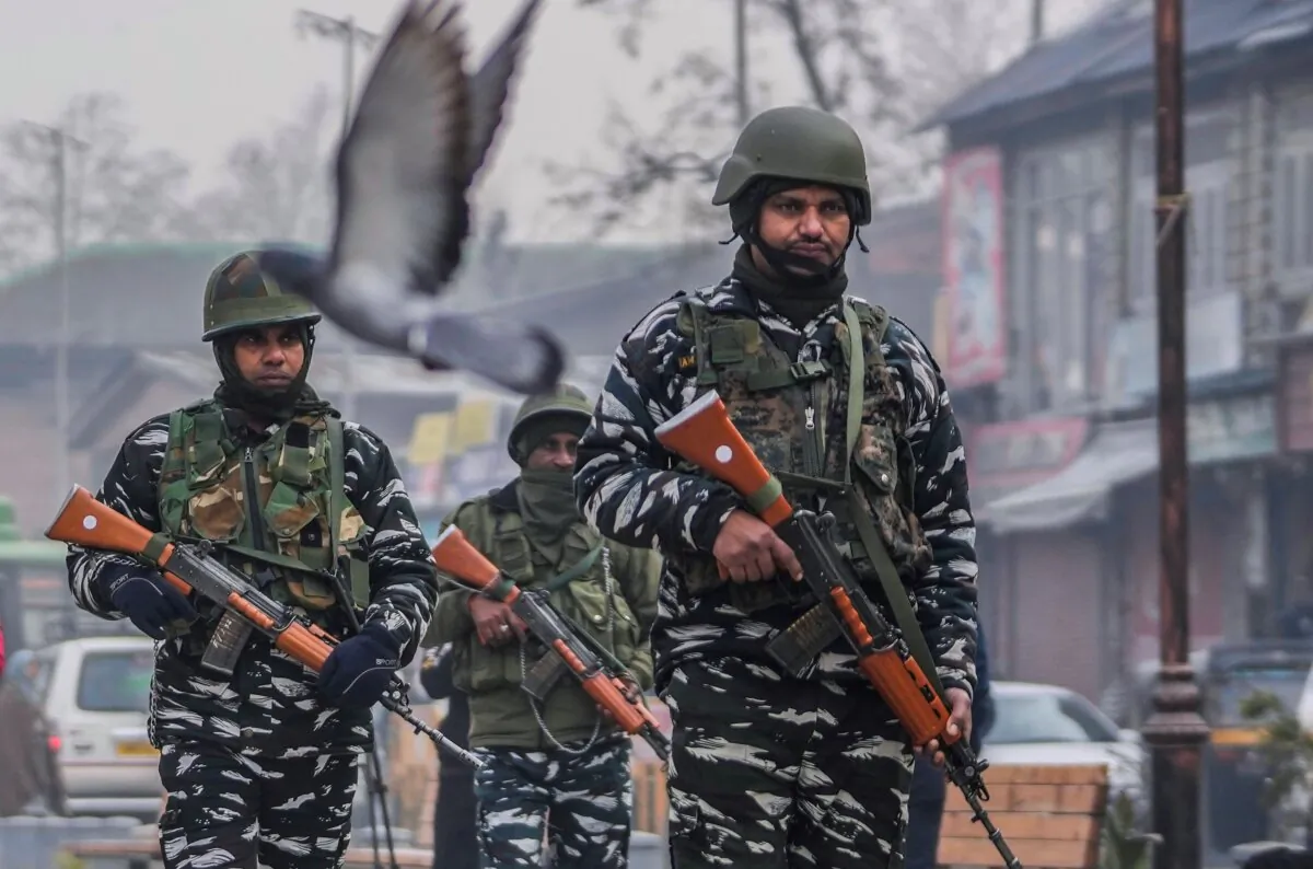 Indian paramilitary soldiers patrol at the main market in Srinagar, Indian controlled Kashmir, on Dec. 11, 2023. (Mukhtar Khan/AP Photo)
