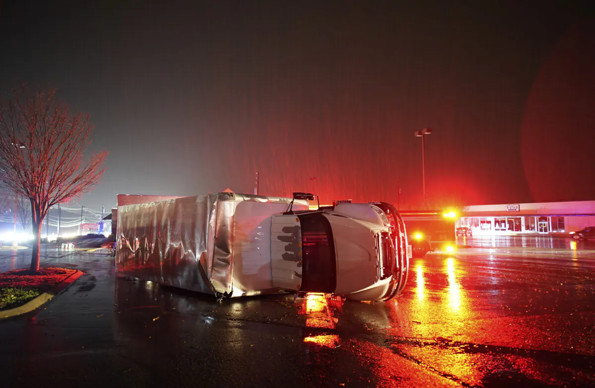A semitrailer is overturned by an apparent tornado on West Main Street in Hendersonville, Tenn., on Dec. 9, 2023. (Andrew Nelles/The Tennessean via AP)