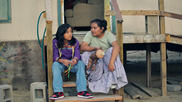 boy and girl sit on stoop in FRYBREAD FACE AND ME