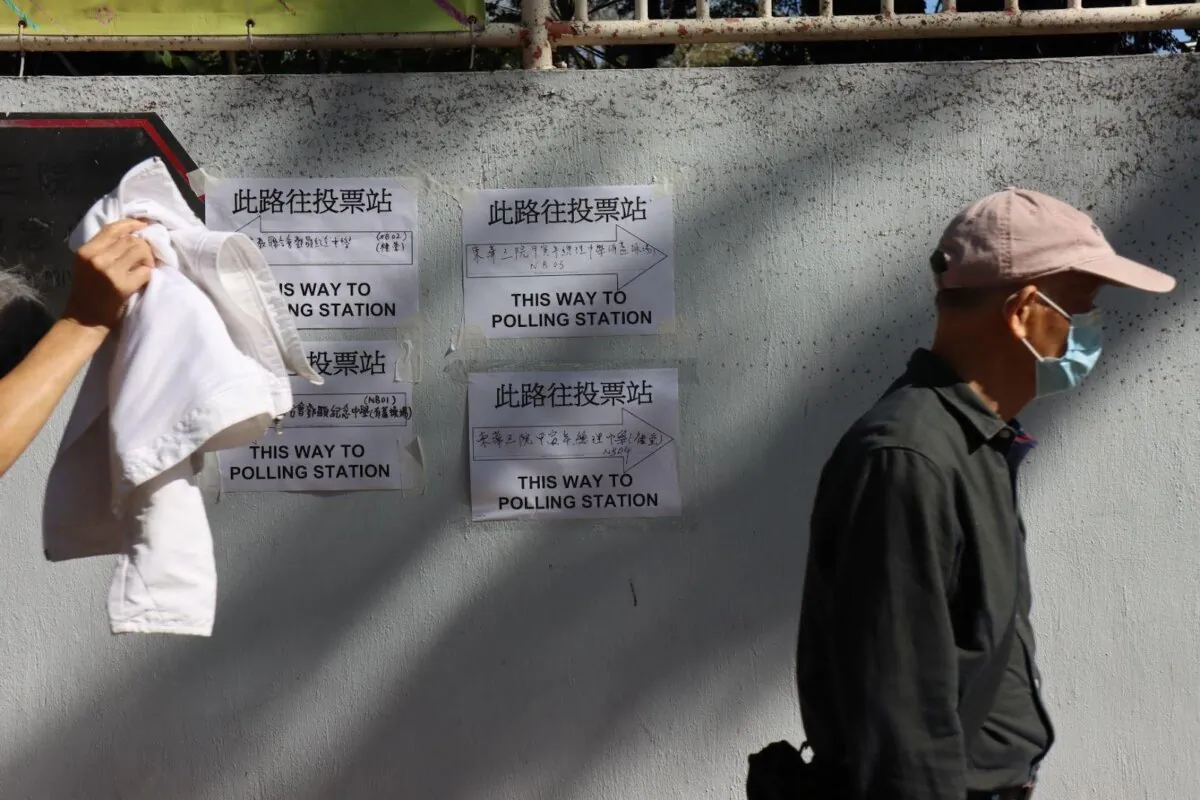 Direction signs for a polling station on the day of the Hong Kong District Council Election on Dec. 10, 2023. Hong Kong. (Terence Tong/The Epoch Times)