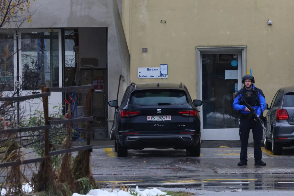 Police secure the area after a shooting in the Swiss town of Sion, Switzerland, on Dec. 11, 2023. (Denis Balibouse/Reuters)