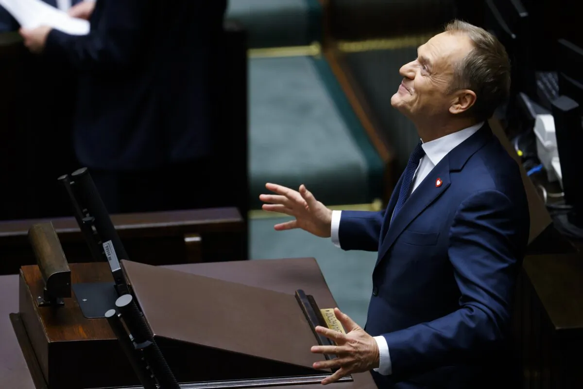 Donald Tusk reacts as he speaks to lawmakers after he was elected as Poland's Prime Minister at the parliament in Warsaw, Poland, on Dec. 11, 2023. (Michal Dyjuk/AP Photo)