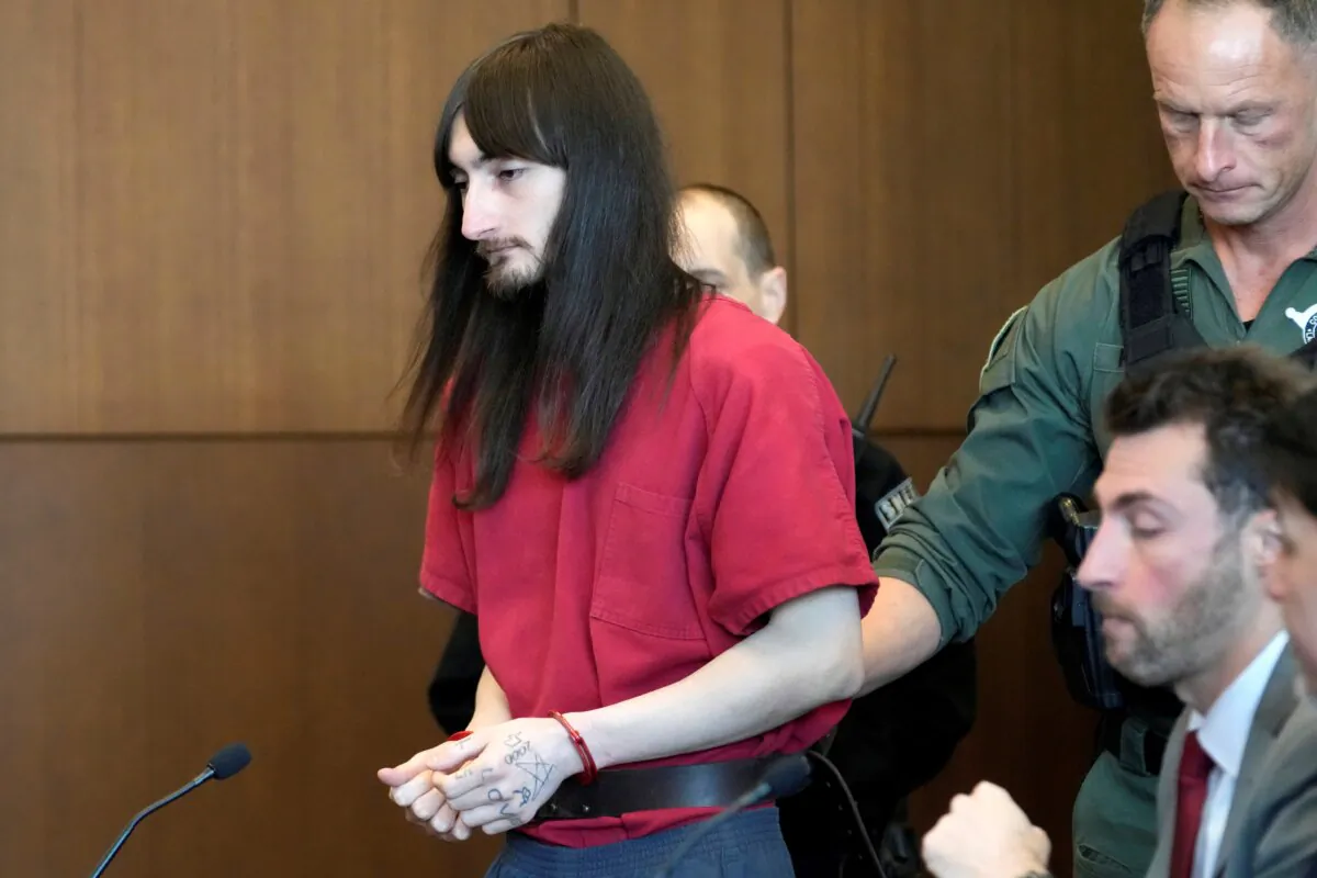 Robert E. Crimo III, is escorted into a courtroom during a case management conference before Judge Victoria A. Rossetti at the Lake County Courthouse in Waukegan, Ill., on Dec. 11, 2023. (Nam Y. Huh/Pool/AP Photo)