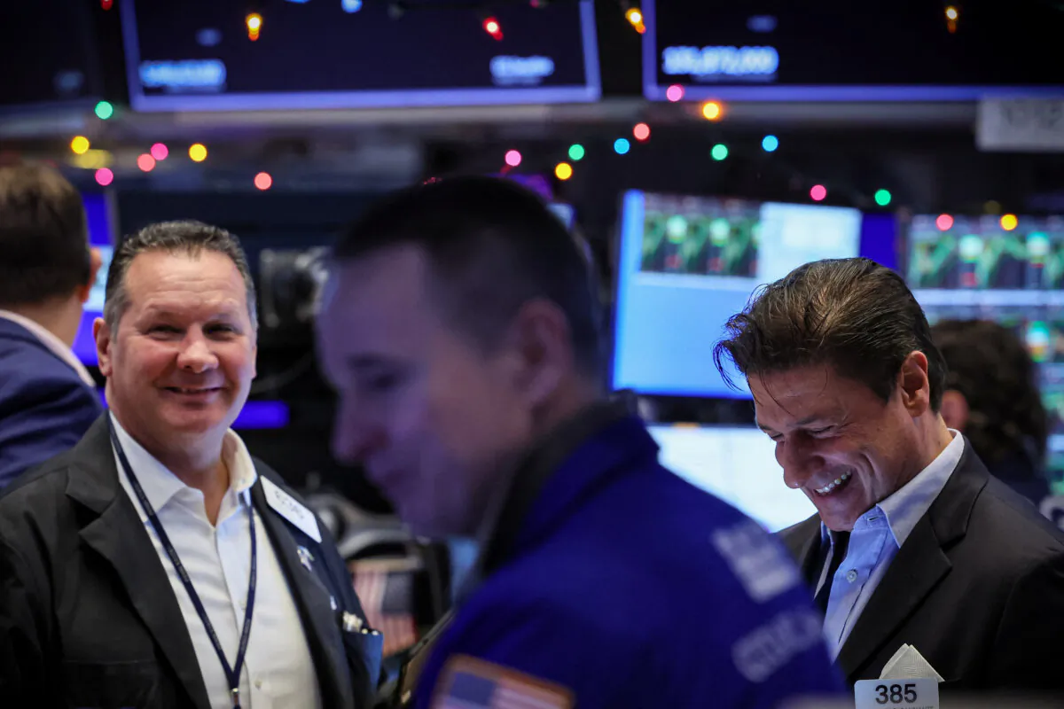 Traders work on the floor at the New York Stock Exchange (NYSE) in New York City on Dec. 11, 2023. (Brendan McDermid/Reuters)