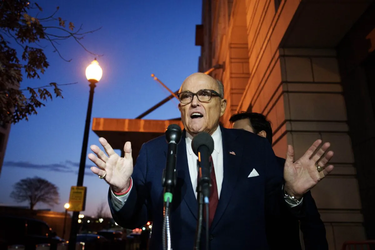 Rudy Giuliani, the former personal lawyer for former President Donald Trump, speaks to the press as he leaves the E. Barrett Prettyman U.S. District Courthouse in Washington on Dec. 11, 2023. (Drew Angerer/Getty Images)