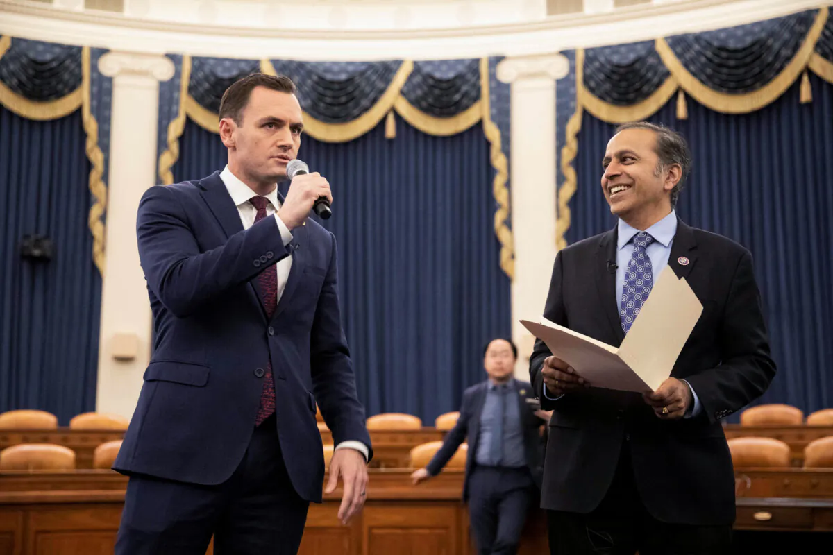 Committee chairman Rep. Mike Gallagher (R-Wis.) and Rep. Raja Krishnamoorthi (D-Ill.) talk over procedures with their members during a House Select Committee on the Strategic Competition Between the United States and the Chinese Communist Party meeting on "Taiwan Tabletop Exercise," a war games simulation, on Capitol Hill in Washington on April 19, 2023. (Amanda Andrade Rhoades/Reuters)