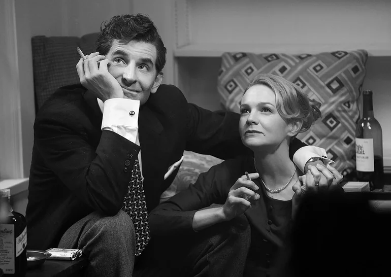 Leonard Bernstein (Bradley Cooper) and Felicia Montealegre (Carey Mulligan), in "Maestro." (Amblin Entertainment/Netflix)