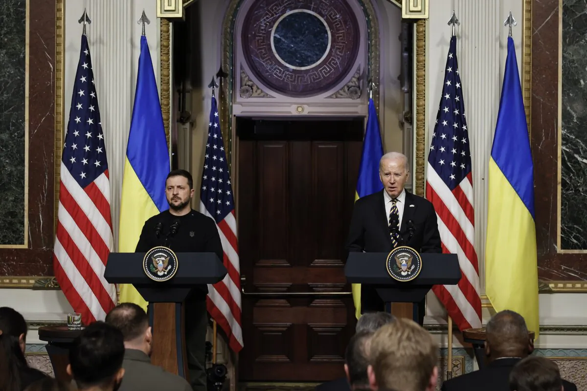 Ukrainian President Volodymyr Zelenskyy and U.S. President Joe Biden hold a news conference in the Indian Treaty Room of the Eisenhower Executive Office Building in Washington on Dec. 12, 2023. (Chip Somodevilla/Getty Images)