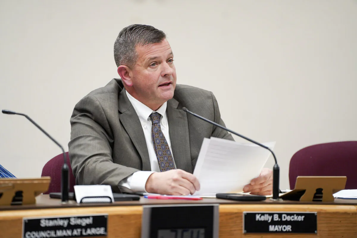 Outgoing Port Jervis Mayor Kelly Decker delivers his farewell speech at city hall in Port Jervis, N.Y., on Dec. 11, 2023. (Cara Ding/The Epoch Times)