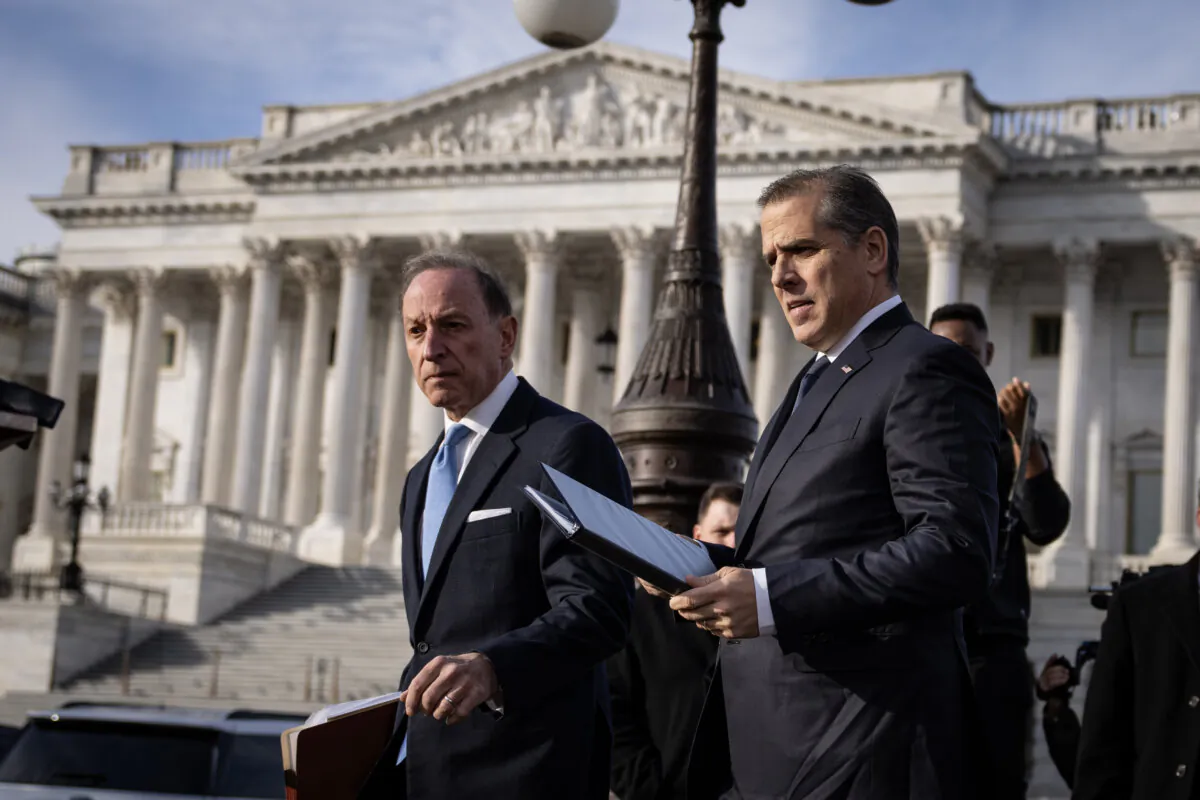 Attorney Abbe Lowell and President Joe Biden's son Hunter Biden (R) arrive to speak to reporters outside the U.S. Capitol in Washington on Dec. 13, 2023. (Drew Angerer/Getty Images)