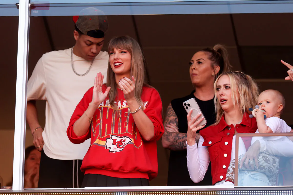 Taylor Swift and Brittany Mahomes react during a game between the Los Angeles Chargers and Kansas City Chiefs at GEHA Field at Arrowhead Stadium in Kansas City, Mo., on Oct. 22, 2023. (Jamie Squire/Getty Images)