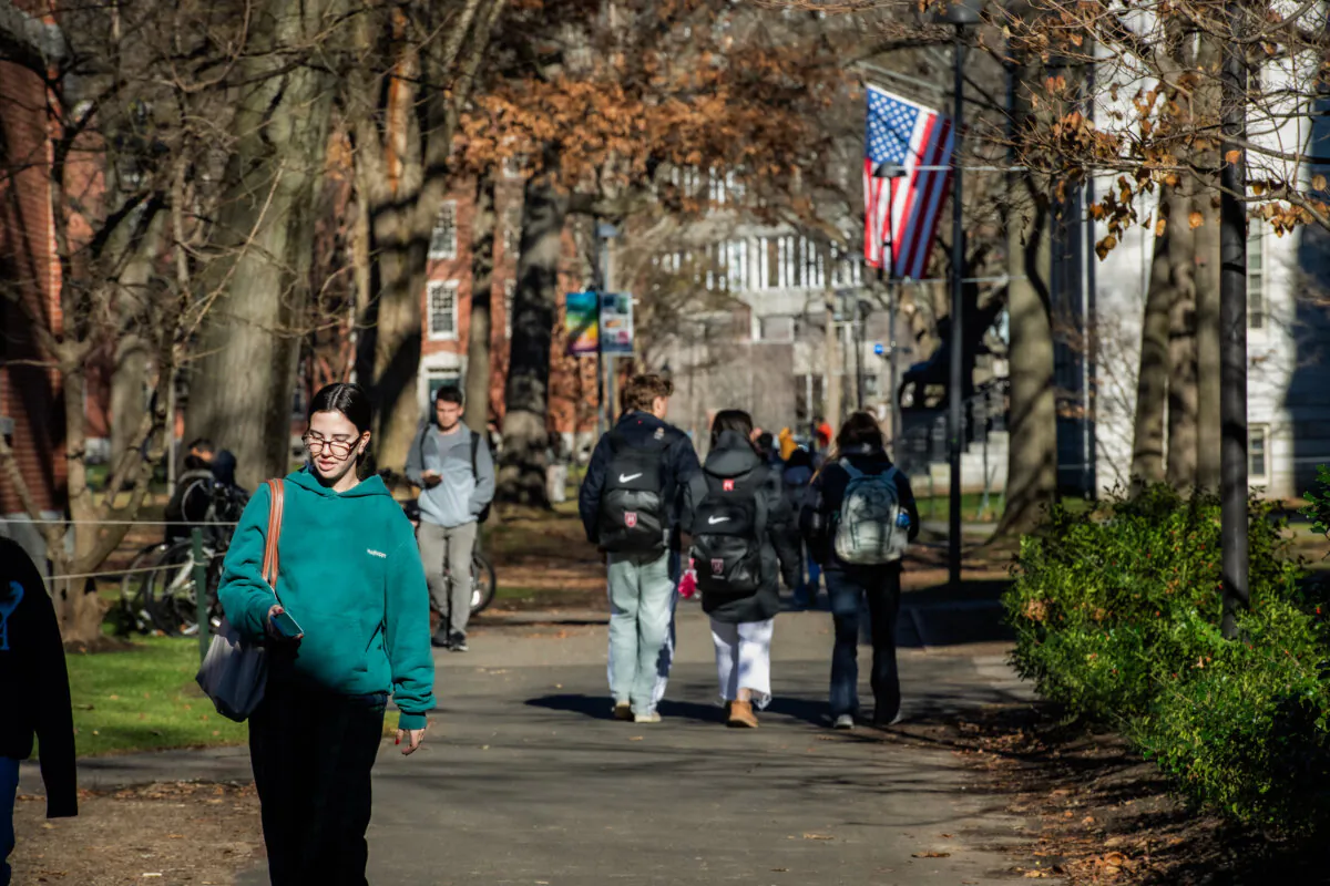 People walk through Harvard University in Cambridge, Mass., on Dec. 12, 2023. (Joseph Prezioso/AFP via Getty Images)