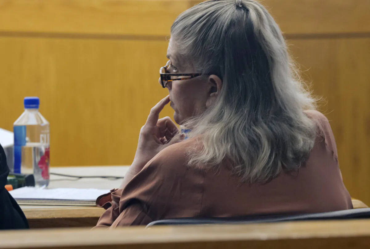 Lisa Dykes listens during the fourth day of her trial in Frank Crowley Courts Building's Criminal District Court 6 in Dallas on Dec. 8, 2023. (Juan Figueroa/The Dallas Morning News via AP)