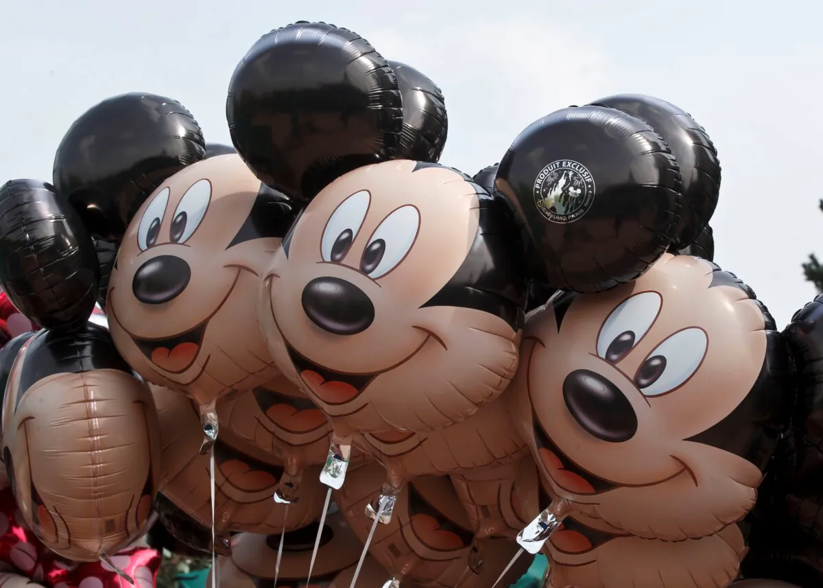 Mickey Mouse balloons appear at Disneyland Paris in Chessy, France, on May 12, 2015. (Michel Euler/AP Photo)