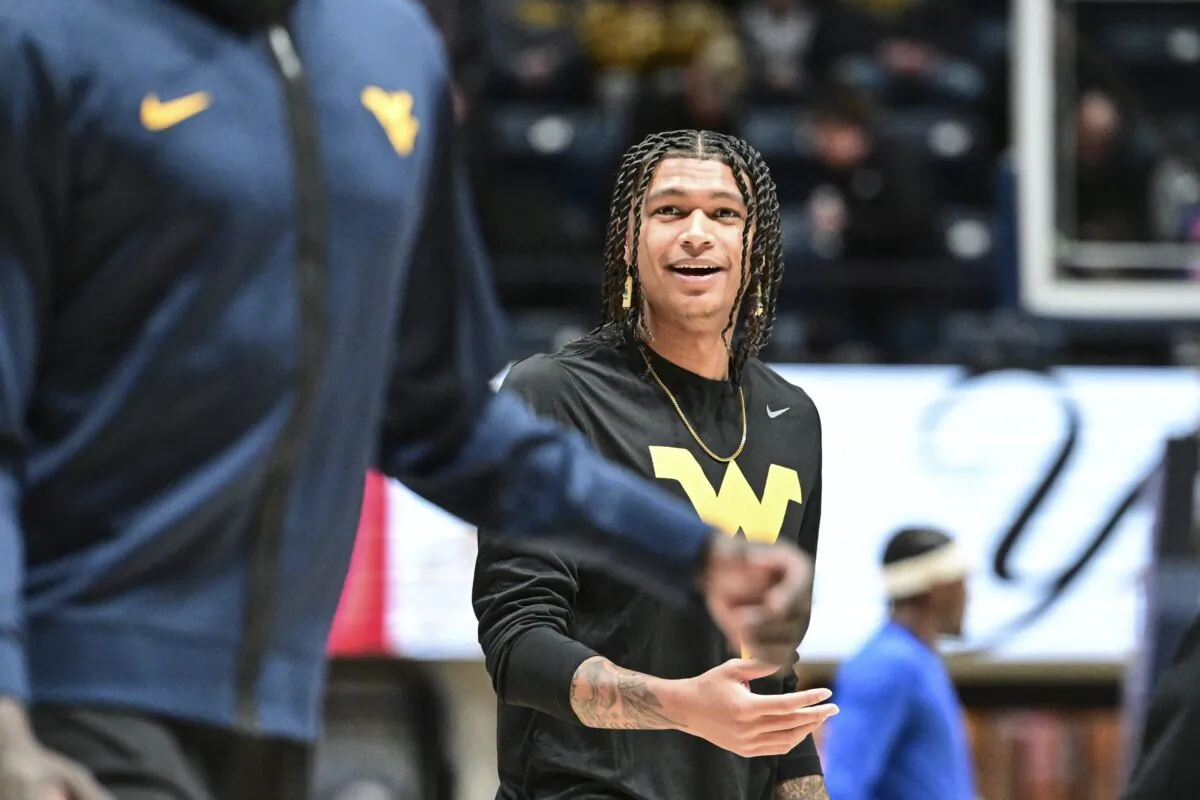 West Virginia Guard RaeQuan Battle looks on prior to the game against the Pittsburgh Panthers in Morgantown, W.Va., on Dec. 6, 2023. (William Wotring/The Dominion-Post via AP)