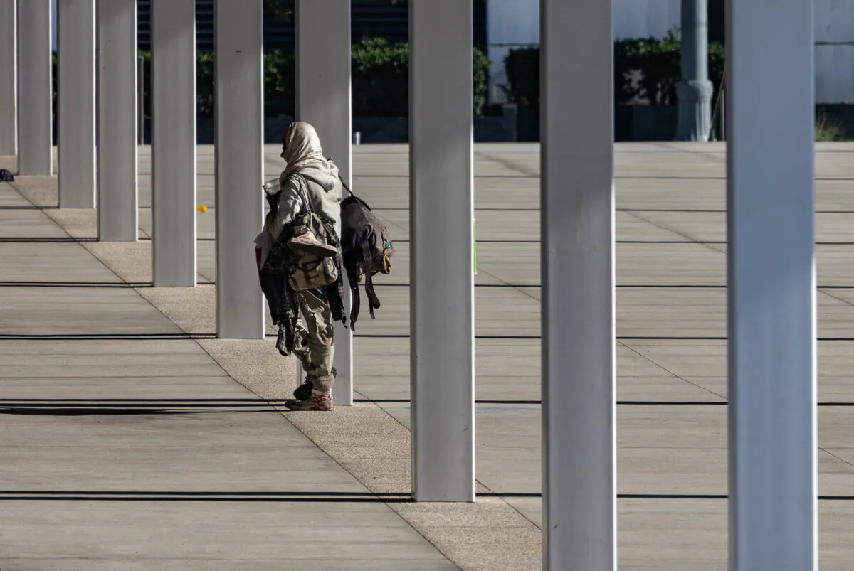 A homeless man in Long Beach, Calif., on Dec. 13, 2023. (John Fredricks/The Epoch Times)