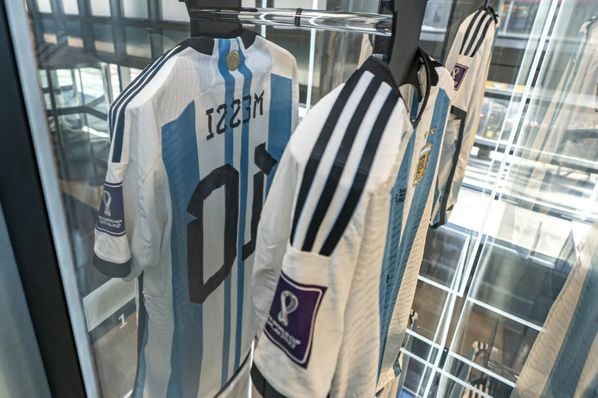 A shirt, worn by soccer player Lionel Messi in a match for Argentina against Saudi Arabia in the 2022 FIFA World Cup, is display at Sotheby's in New York on Nov. 30, 2023. (Peter K. Afriyie/AP Photo)