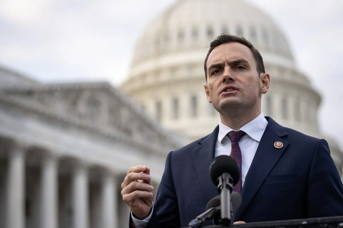 Chairman of the House Select Committee on China Rep. Mike Gallagher (R-Wis.) delivers remarks to commemorate the one-year anniversary of the White Paper movement in China alongside a group of students and Chinese pro-democracy activists outside the U.S. Capitol in Washington, on Nov. 29, 2023. (Drew Angerer/Getty Images)