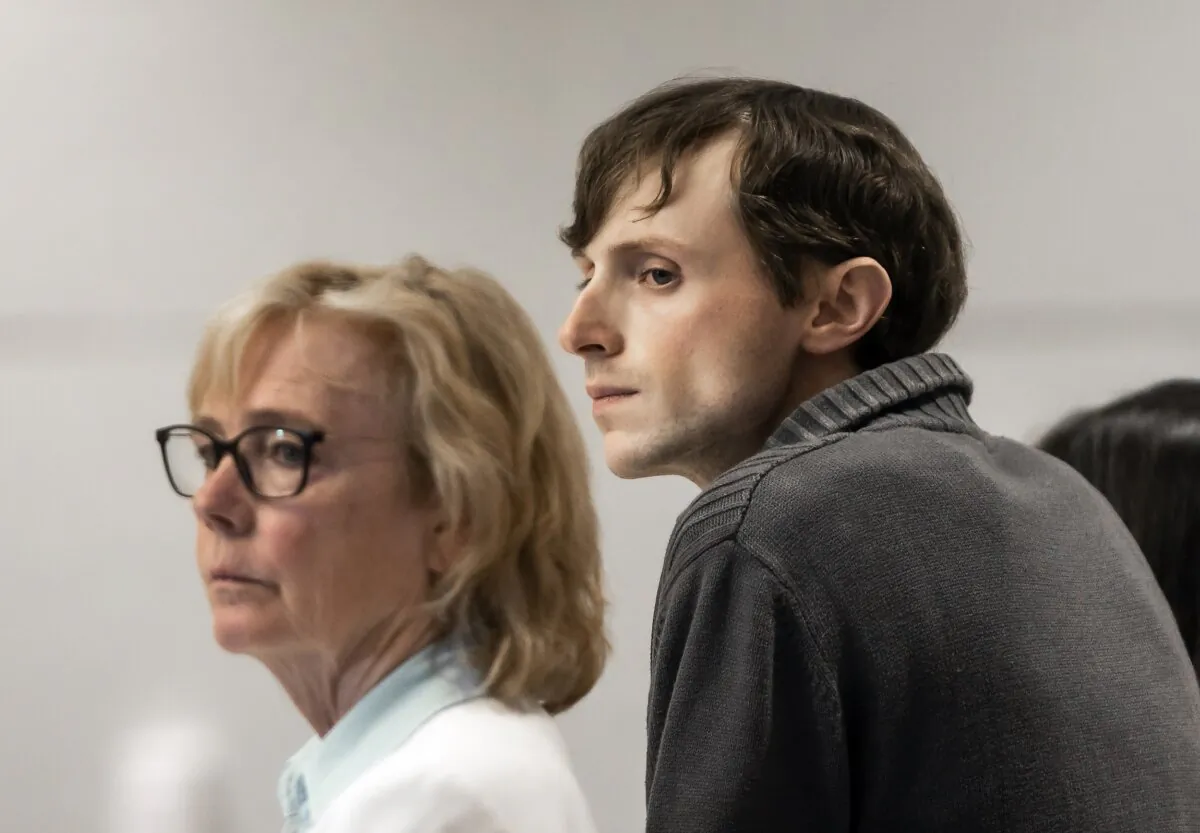Logan Clegg (R) and defense attorney Caroline Smith look over at the jury as they are polled at Merrimack County Superior Court in Concord, N.H., on Oct. 23, 2023. (Geoff Forester/The Concord Monitor via AP, Pool)