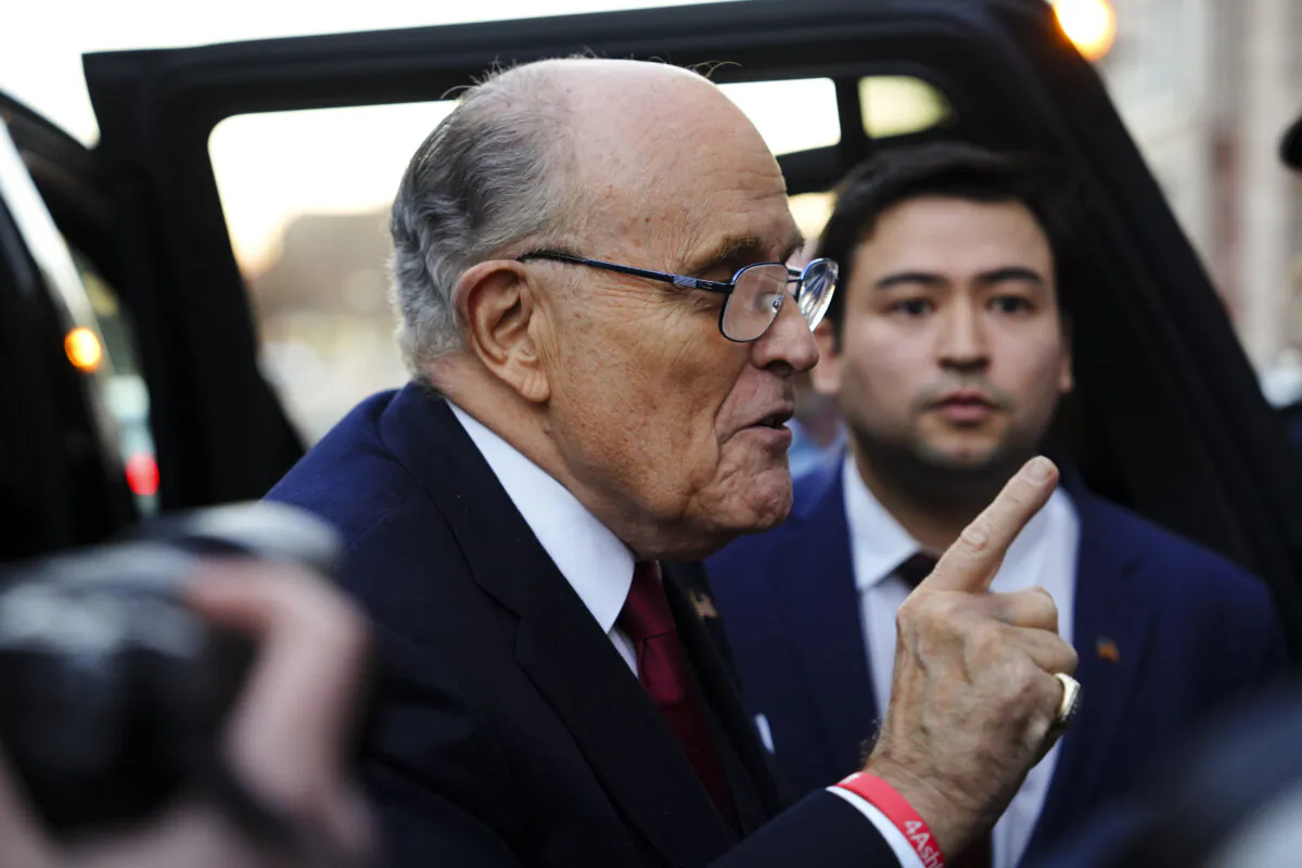 Rudy Giuliani, a former lawyer of former president Donald J. Trump, leaves the E. Barrett Prettyman U.S. District Courthouse after jury deliberation in Washington on Dec. 15, 2023. (Madalina Vasiliu/The Epoch Times)