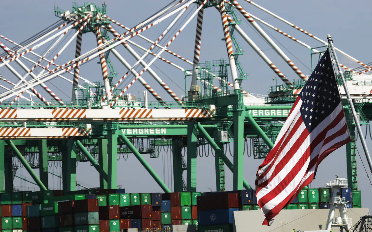 Cranes stand above shipping containers at the Port of Los Angeles, which is the nation's busiest container port, on March 6, 2020, in Terminal Island, Calif. (Mario Tama/Getty Images)