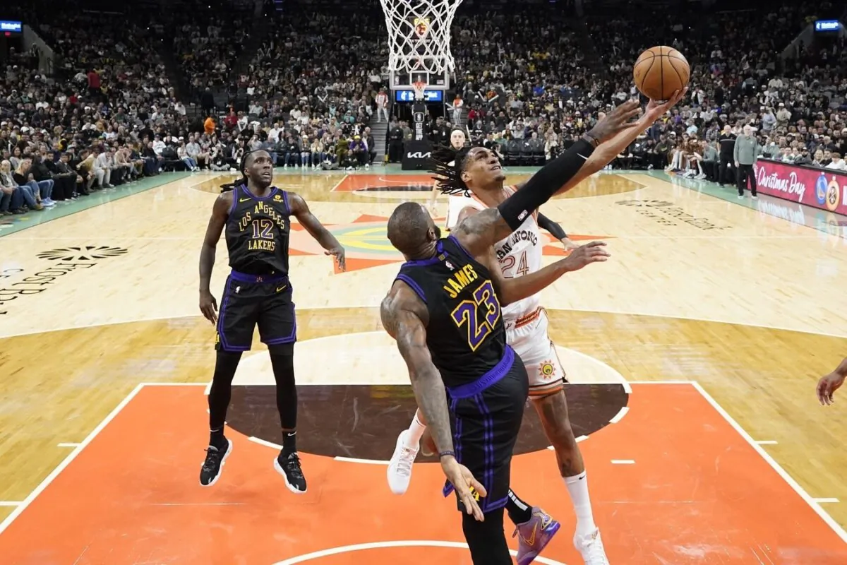 San Antonio Spurs guard Devin Vassell (24) drives to the basket against Los Angeles Lakers forward LeBron James (23) during the second half in San Antonio on Dec. 15, 2023. (Scott Wachter/USA TODAY Sports via Field Level Media)