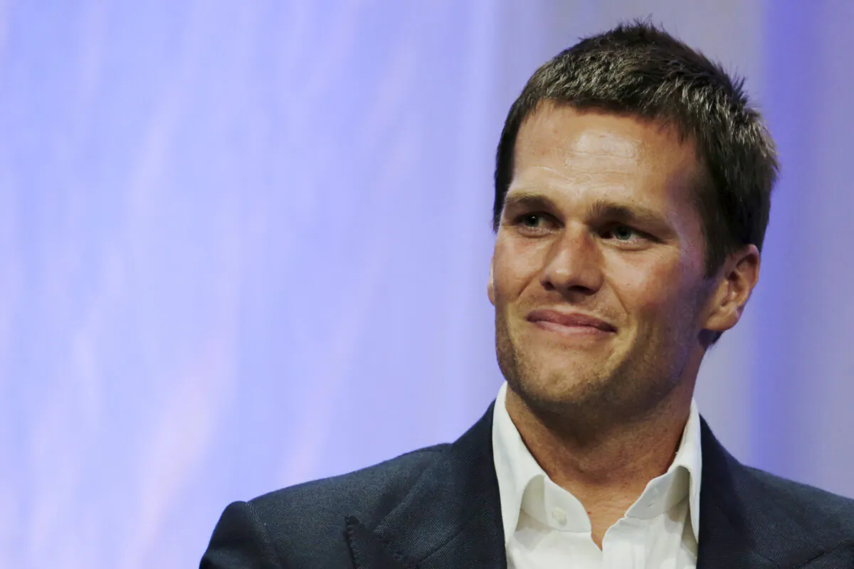 New England Patriots quarterback Tom Brady speaks at Salem State University in Salem, Massachusetts, on May 7, 2015.  (Charles Krupa/Pool via Reuters)