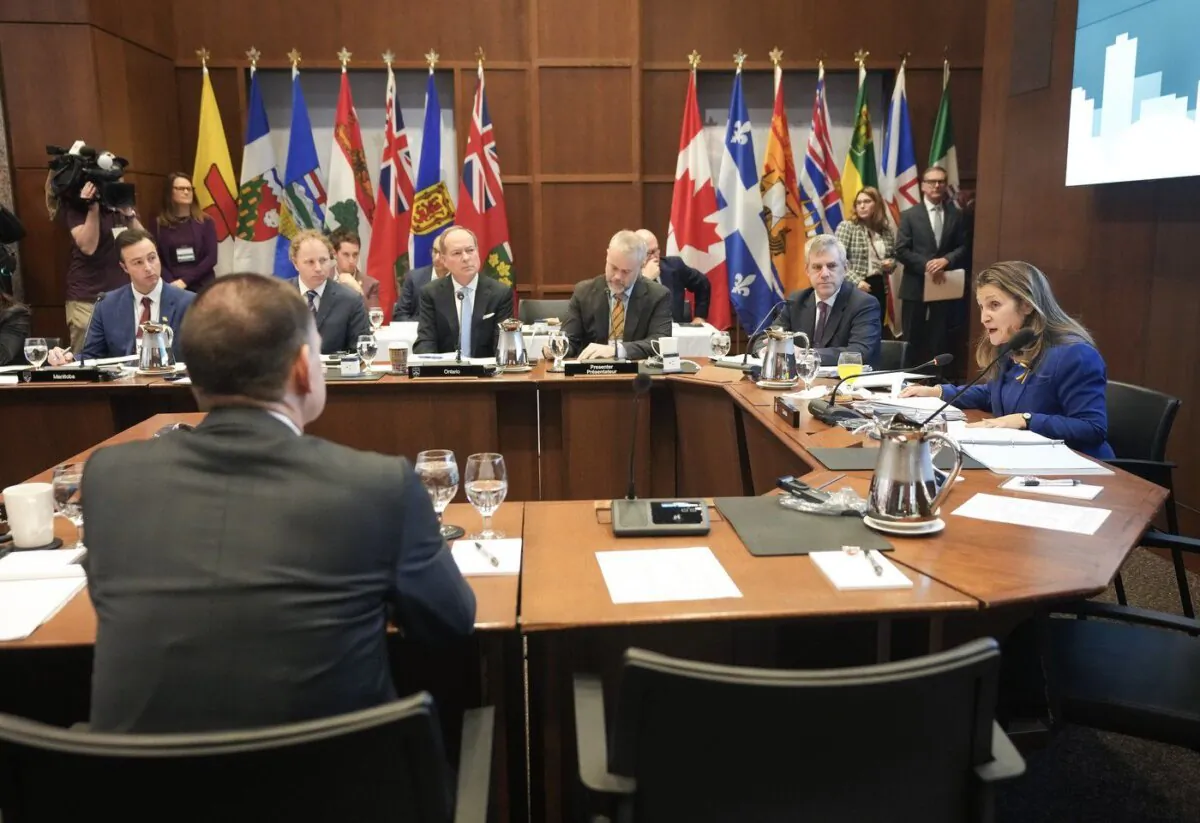 Chrystia Freeland, Canada's Deputy Prime Minister and Minister of Finance, right, speaks as she hosts the annual meeting of federal, provincial, and territorial finance ministers in Toronto on Dec. 15, 2023. (The Canadian Press/Nathan Denette)
