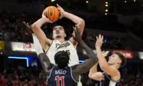Loyer, Smith Lead No. 3 Purdue Past No. 1 Arizona 92–84 in NCAA Showdown
