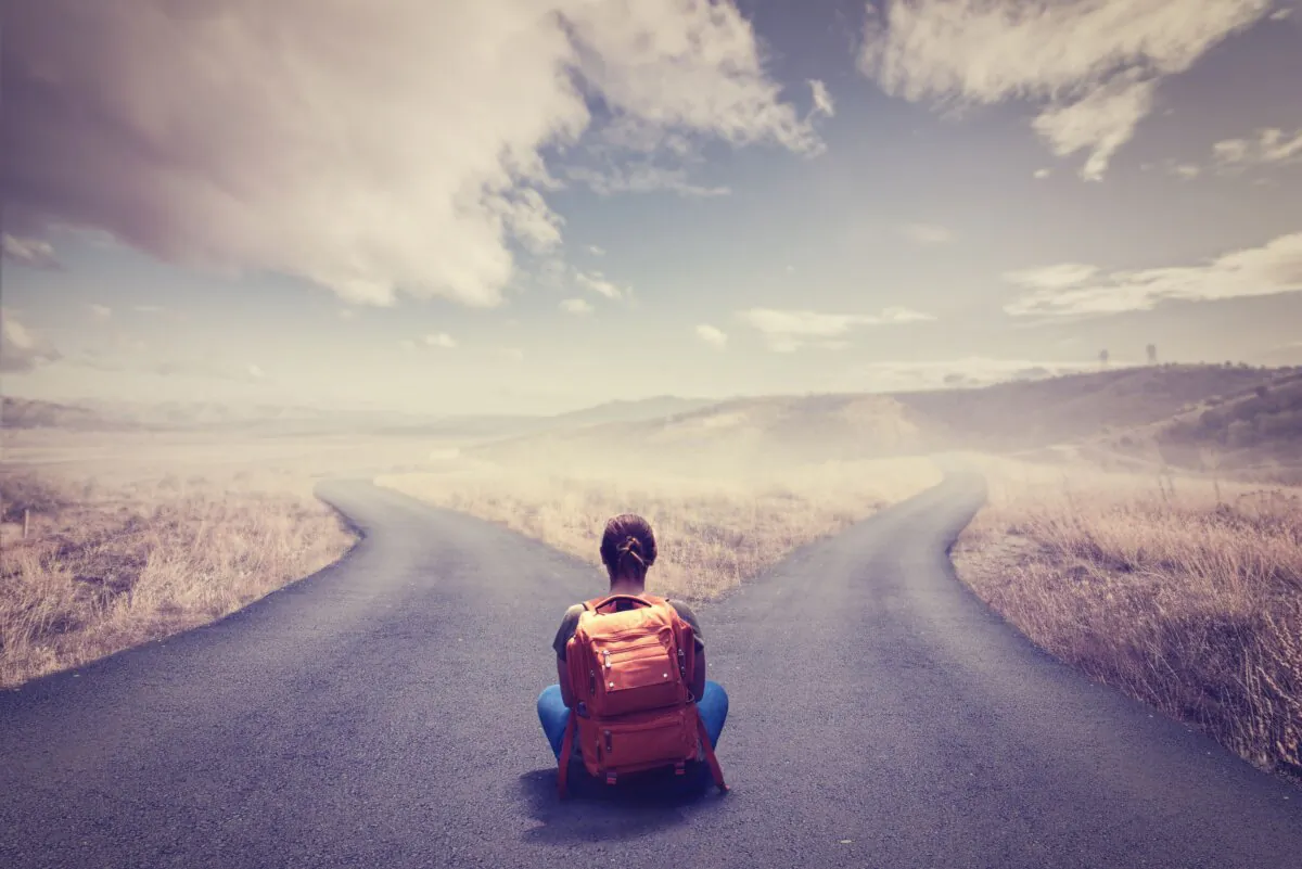 The "Road Not Taken" by Robert Frost has always been seen as an anthemic poem of taking the road less traveled, until it is not. (Sondem/Shutterstock)