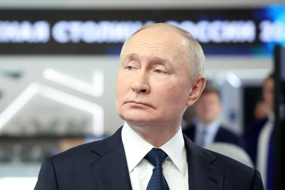 Russia's President Vladimir Putin visits the exhibition of achievements "Russia" prior to the United Russia party congress in Moscow on Dec. 17, 2023. (Sergey FADEICHEV/POOL/AFP)