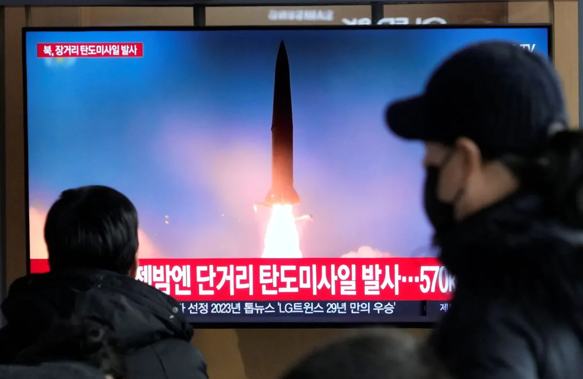 A TV screen shows a file image of North Korea's missile launch during a news program at the Seoul Railway Station in Seoul, South Korea, on Dec. 18, 2023. (Ahn Young-joon/AP Photo)