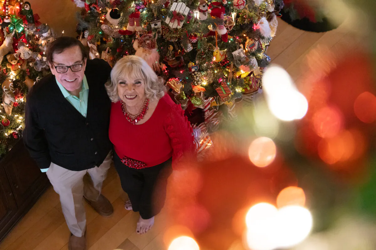 The Nash and Lillestrand family stands near Christmas décor in their home in Chino Hills, Calif., on Dec. 12, 2023. (John Fredricks/The Epoch Times)