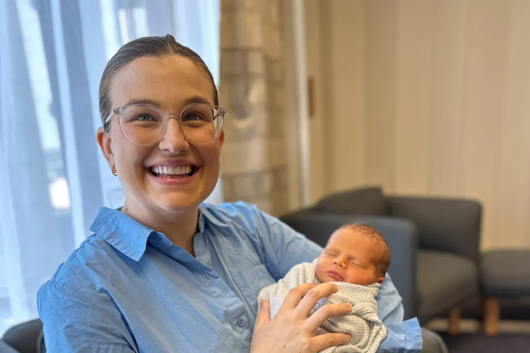 Image of Kristy and her child Henry after Australia's first birth from uterus transplant. (Courtesy of NSW Health)