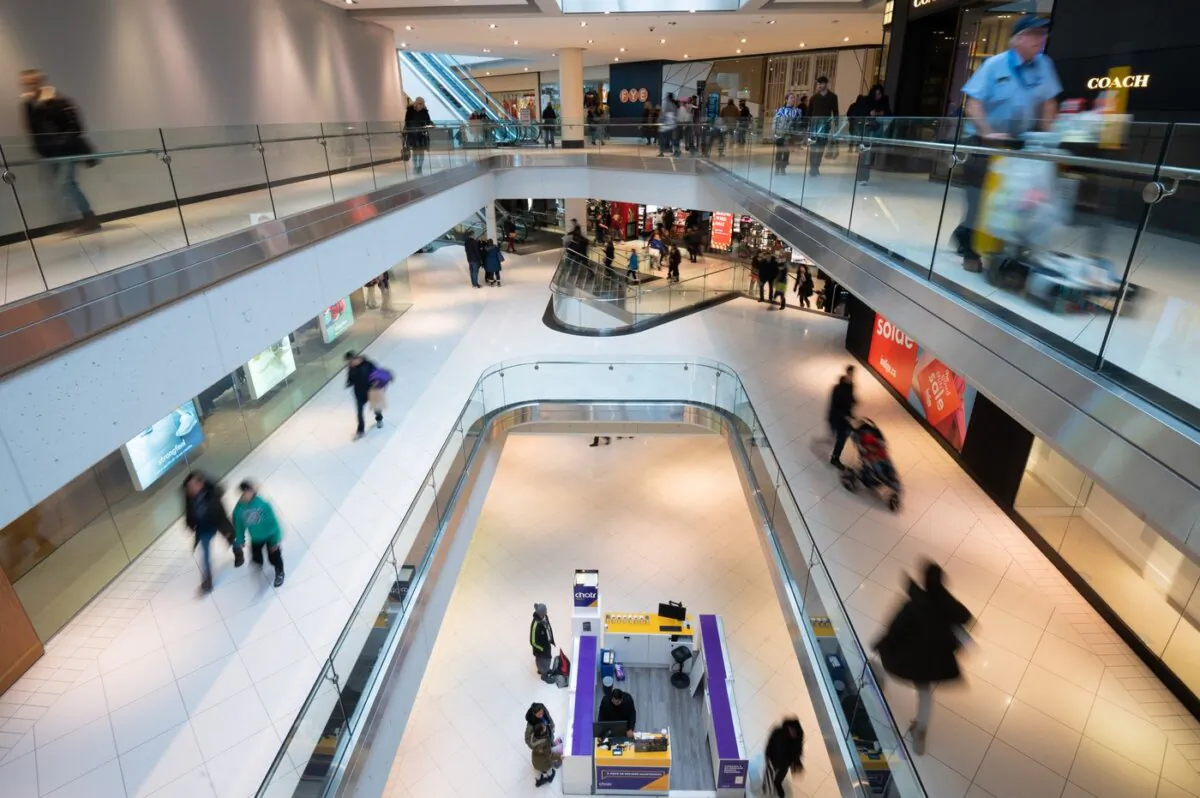 People make their way around the Rideau Center shopping centre on Boxing Day in Ottawa, on Dec. 26, 2022. (The Canadian Press/Spencer Colby)