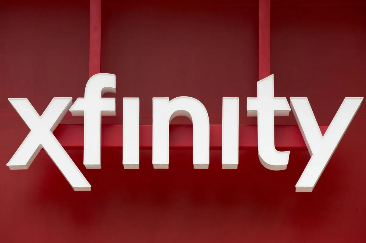 Signage for Xfinity, the cable division of Comcast, is displayed in Philadelphia on July 15, 2015. (Matt Rourke/AP Photo)