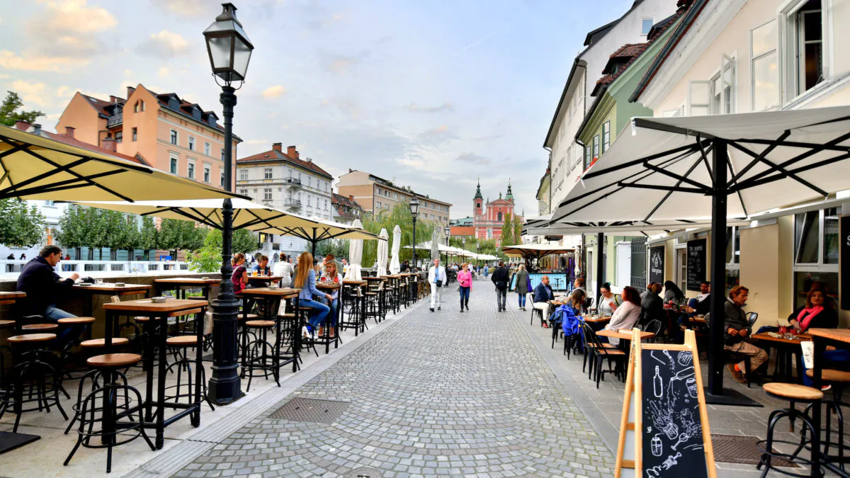 Ljubljana's riverfront promenade is lined with quaint boutiques, great restaurants, and cafes ripe for people-watching. (Cameron Hewitt/TNS)