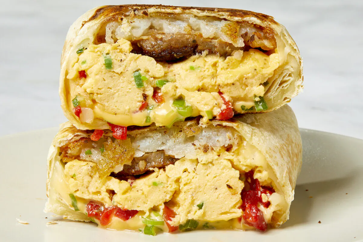 This hearty breakfast burrito is stuffed with fluffy scrambled eggs, crispy hash browns, pork sausage, and a special spicy, creamy sauce. (Alex Lepe/TNS)