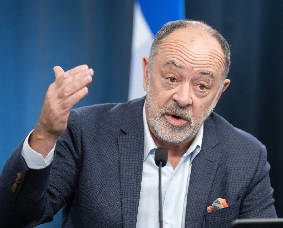 Quebec's Health Minister Christian Dubé updates the vaccination and emergency room situation during a press briefing in Montreal on Dec. 19, 2023. (The Canadian Press/Ryan Remiorz)