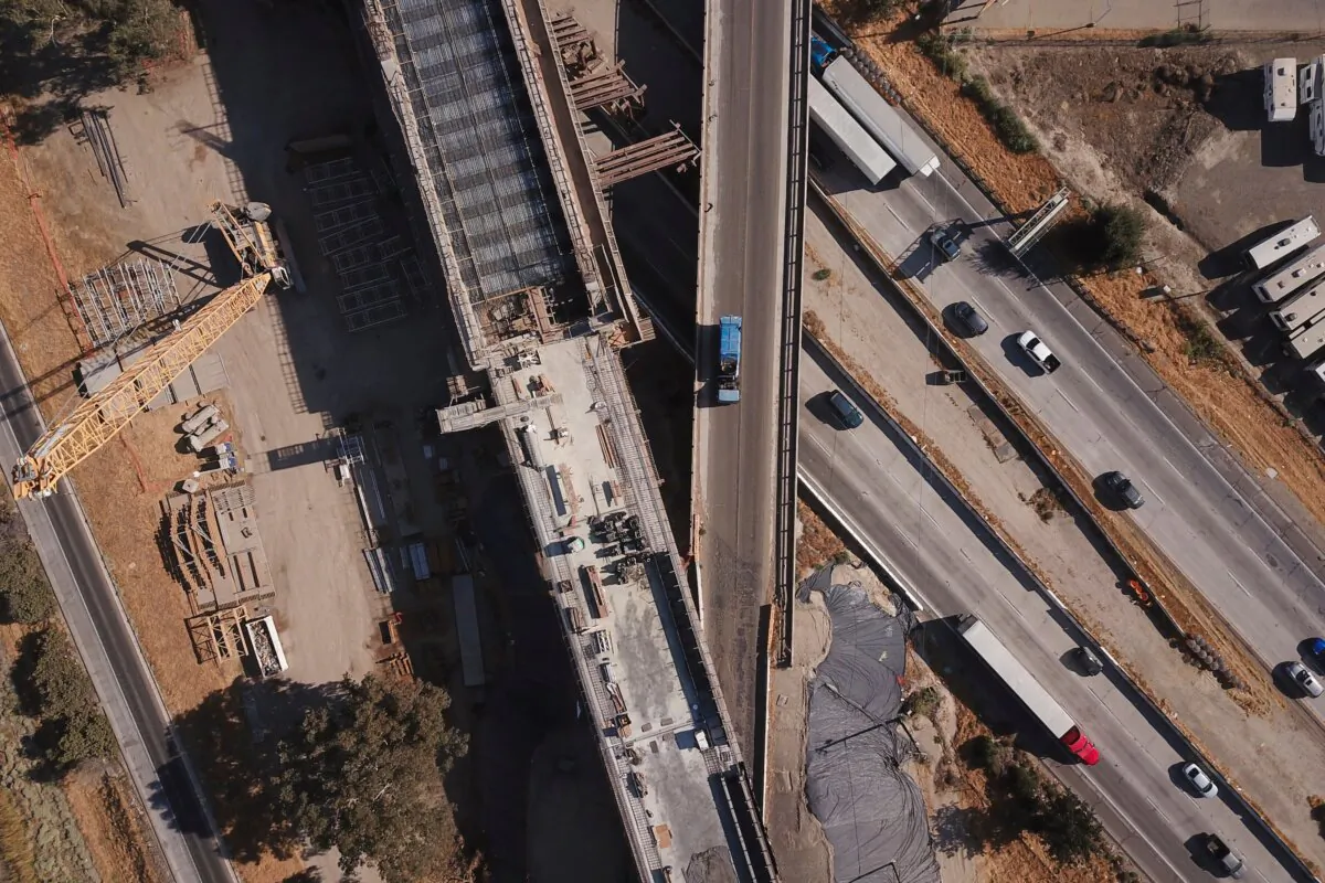 An aerial image of construction of a high-speed rail project over State Route 99 through the Central Valley in Fresno, California, on August 26, 2021. (Patrick T. Fallon/AFP via Getty Images)