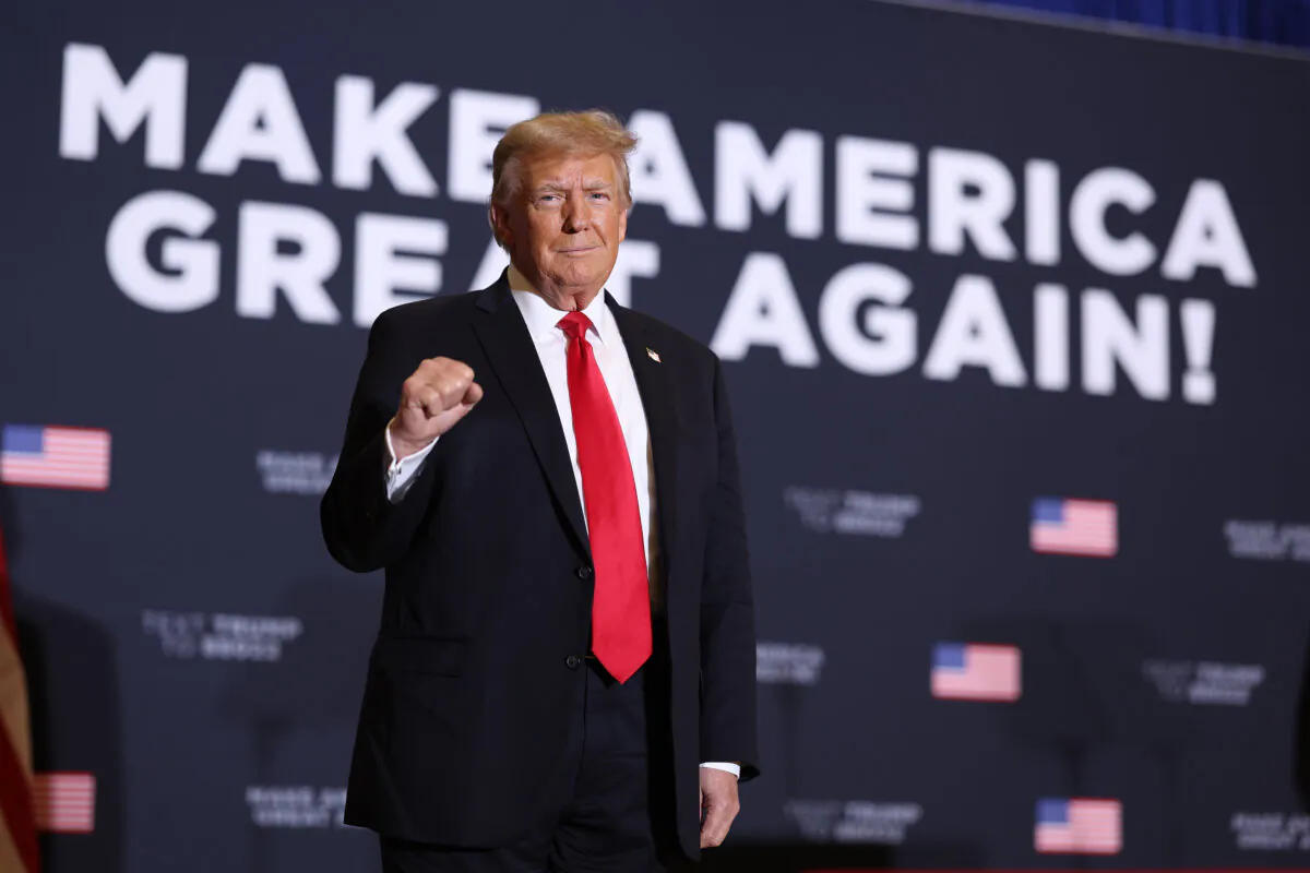 Republican presidential candidate former President Donald Trump arrives at a campaign event at the Hyatt Hotel in Coralville, Iowa, on Dec. 13, 2023. (Scott Olson/Getty Images)