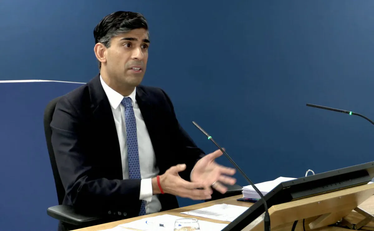 A video grab from footage broadcast by the UK COVID-19 Inquiry shows Britain's Prime Minister Rishi Sunak giving evidence in London, on Dec. 11, 2023. (UK Covid-19 Inquiry/AFP via Getty Images)
