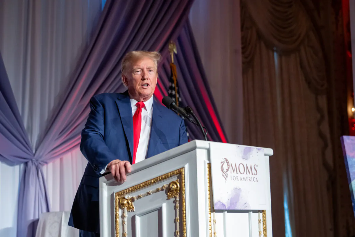 Former President Donald Trump receives the first-ever Founding Fathers Award from Moms of America at the Mothers of Influence & Champion of Freedom Awards in Palm Beach, Fla., on Dec. 8, 2023.(Courtesy Moms for America)