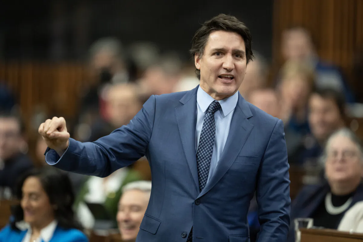 Prime Minister Justin Trudeau rises during Question Period, on Dec. 12, 2023 in Ottawa. (The Canadian Press/Adrian Wyld)