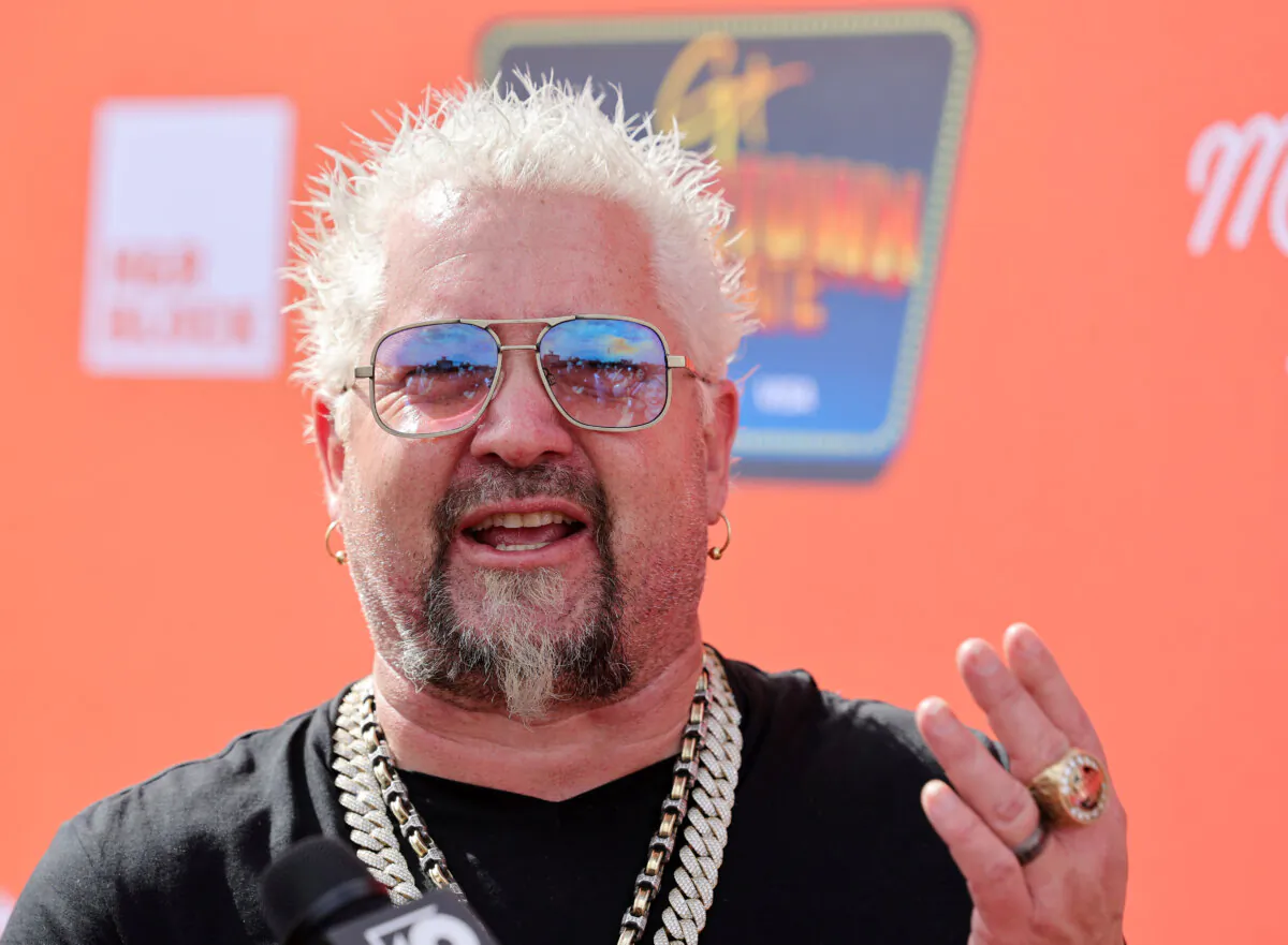 Guy Fieri is interviewed at Guy Fieri's Flavortown Tailgate in Glendale, Ariz., on Feb. 12, 2023. (Ethan Miller/Getty Images)