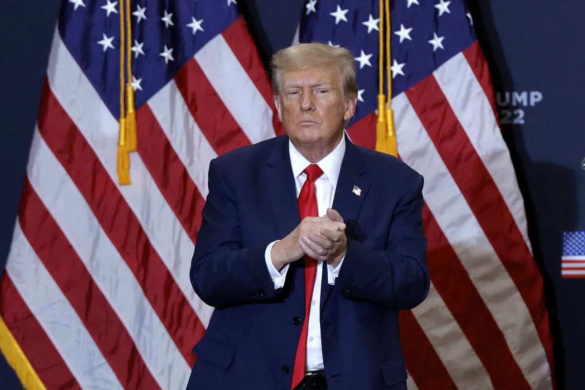 Former President and 2024 presidential hopeful Donald Trump gestures at the end of a campaign event in Waterloo, Iowa, on Dec. 19, 2023. (Kamil Krzaczynski/AFP via Getty Images)